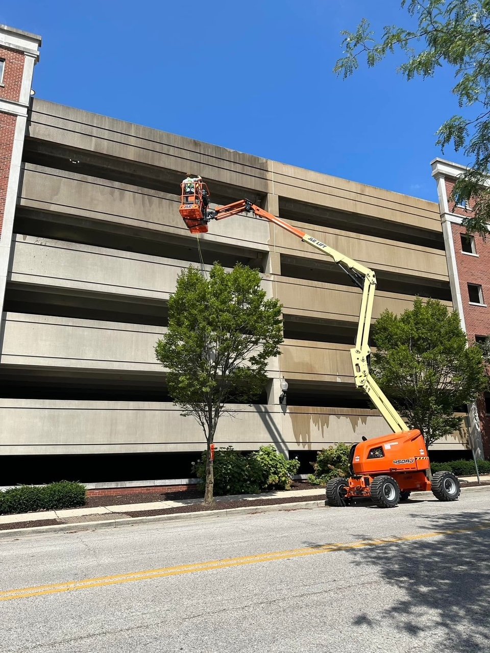 Using 12V softwash system on parking garage exterior