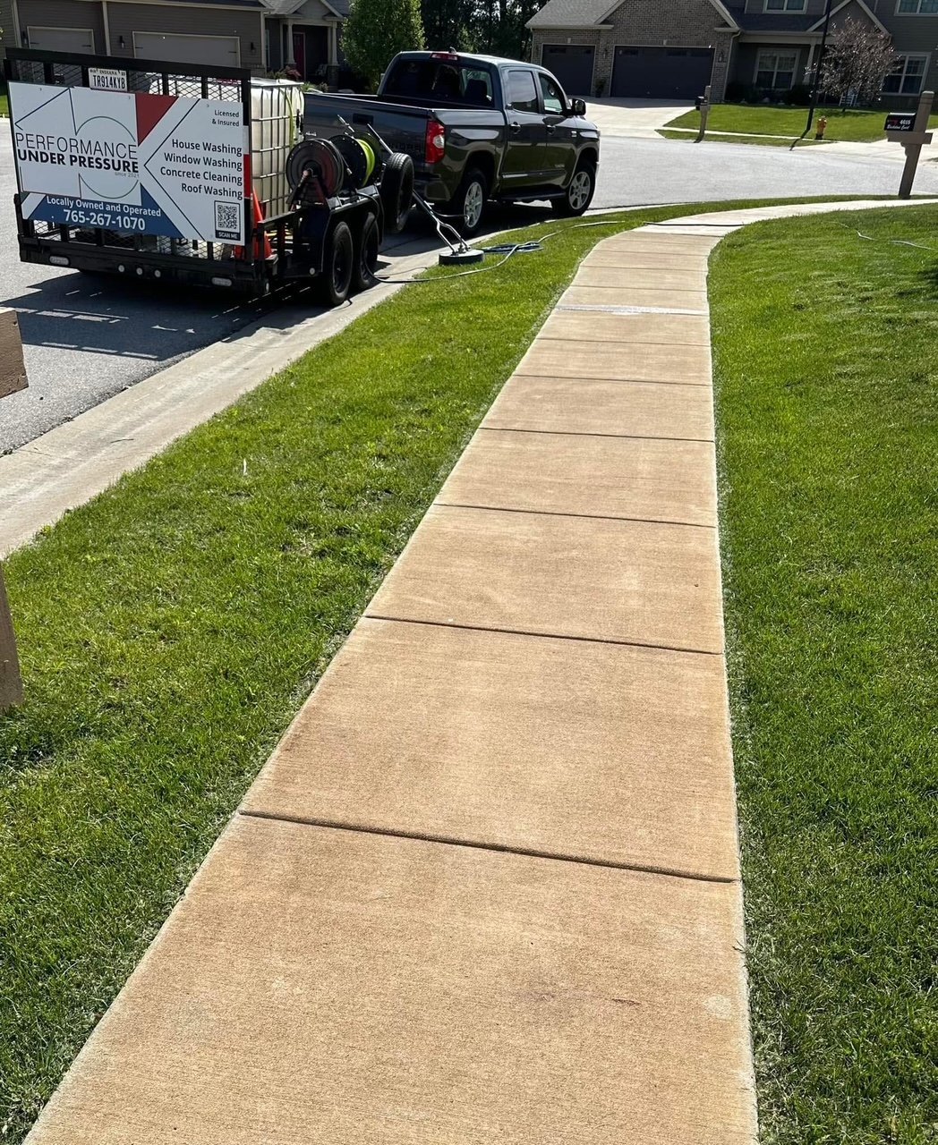 Rust stain before removal on sidewalk